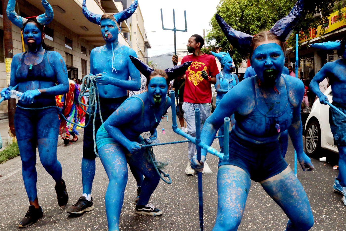 Blue devil characters in traditional Carnival mas